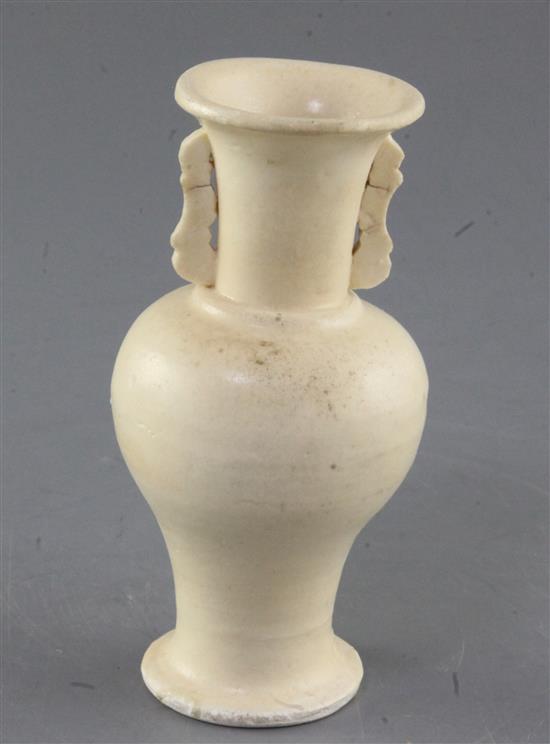 A small Chinese Dehua two handled baluster vase, Song dynasty, height 12.5cm